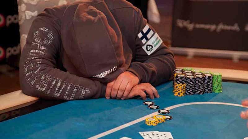 Man Sleeping At Poker Table